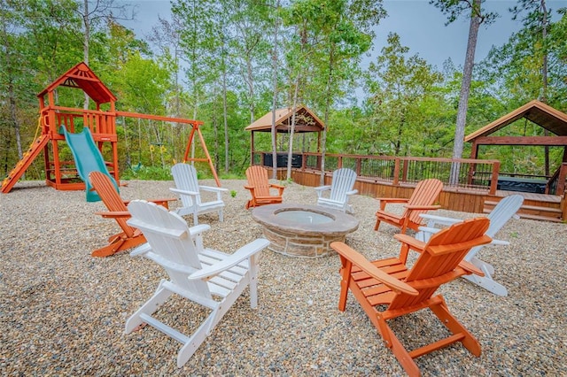 view of play area with a fire pit