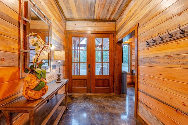 1080 N Lukfata Trail Rd, Broken Bow, OK 74728 - foyer featuring wood walls, french doors, concrete floors, and wooden ceiling