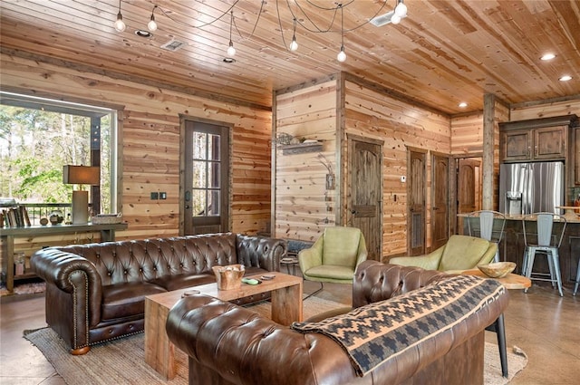 living area with recessed lighting, wood ceiling, and wooden walls