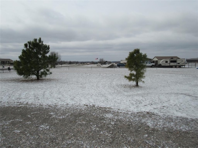 view of yard with a rural view