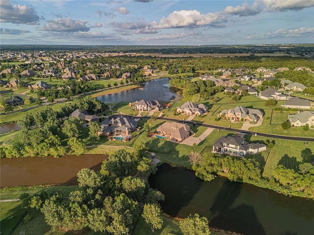 aerial view featuring a water view and a residential view