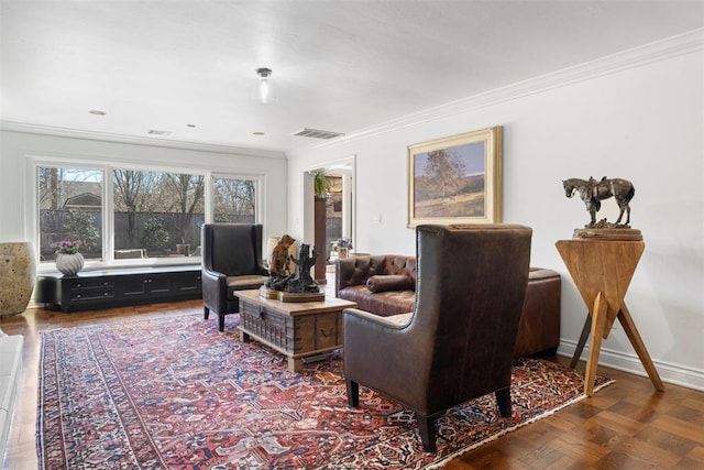 living room with visible vents, crown molding, and baseboards