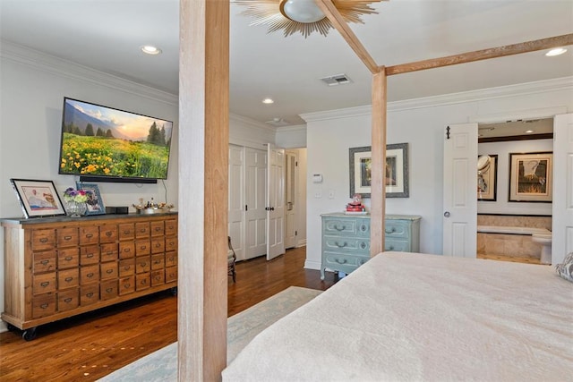 bedroom featuring recessed lighting, visible vents, wood finished floors, and ornamental molding