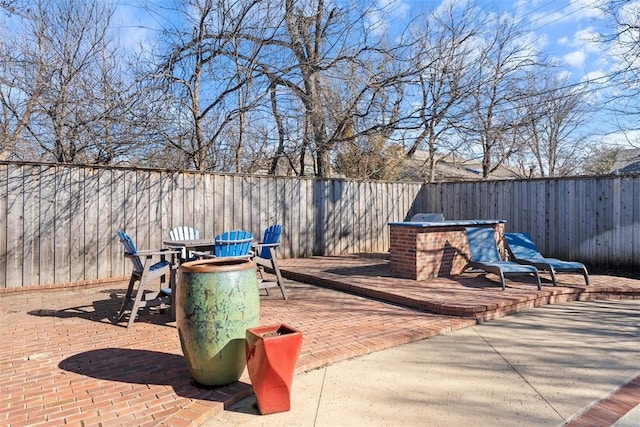 view of patio featuring a fenced backyard