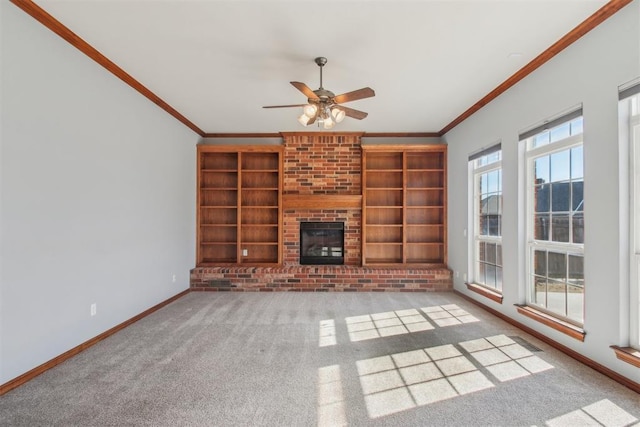 unfurnished living room with light carpet, a fireplace, baseboards, and ornamental molding