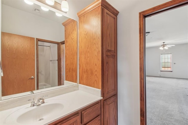 full bathroom with a shower, a closet, visible vents, and vanity