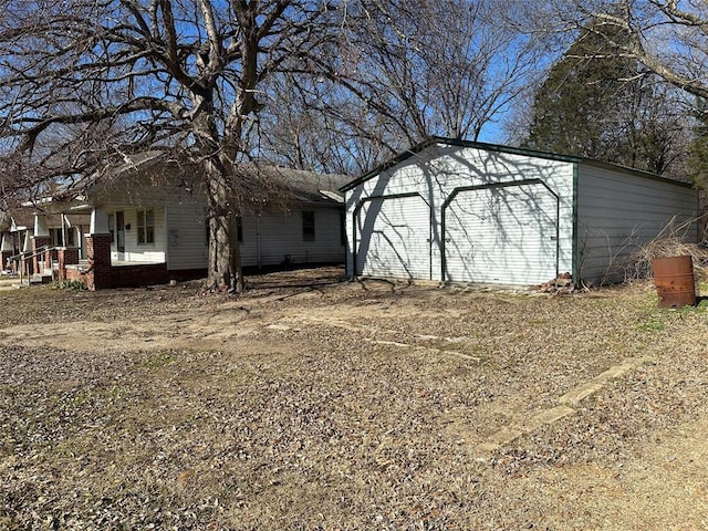 exterior space with an outbuilding and covered porch