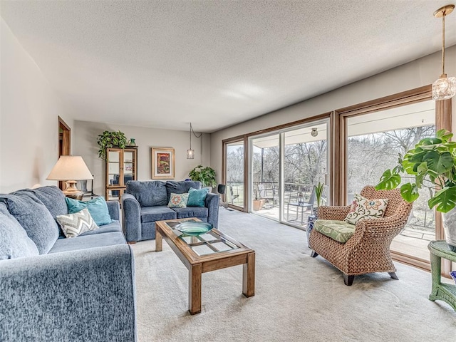 1802 N 15th St, Perry, OK 73077 - carpeted living area with a textured ceiling