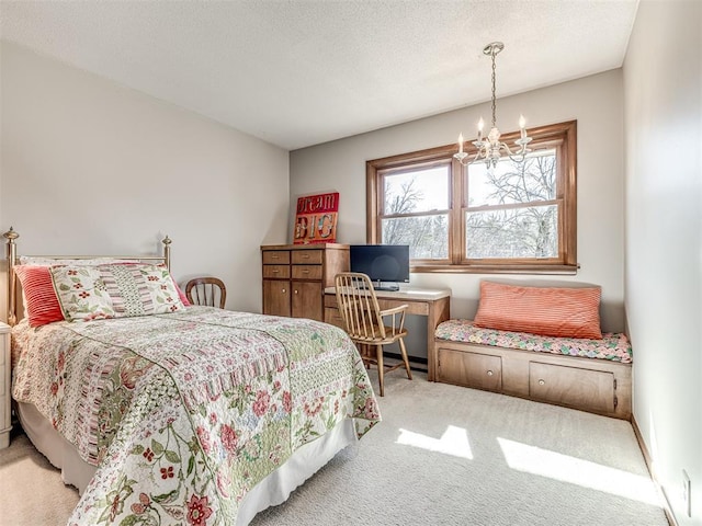 1802 N 15th St, Perry, OK 73077 - bedroom featuring carpet, a chandelier, a desk, and a textured ceiling