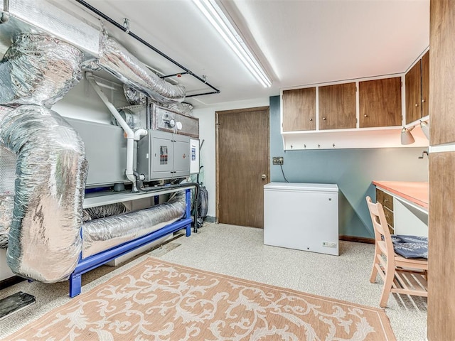 1802 N 15th St, Perry, OK 73077 - laundry room with carpet