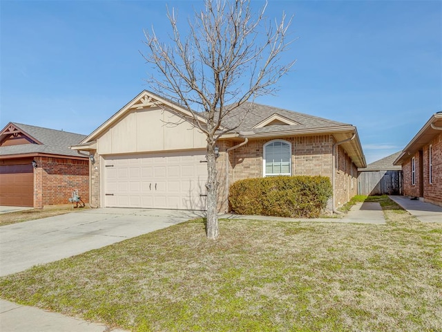 ranch-style home with a front lawn and a garage