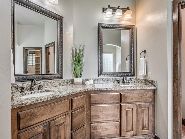 8275 Elk Grv, Blanchard, OK 73010 - bathroom featuring double vanity