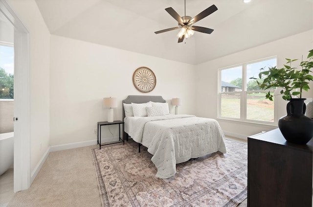 10949 Sandstone Ridge Way, Guthrie, OK 73044 - bedroom with multiple windows, baseboards, light colored carpet, and high vaulted ceiling