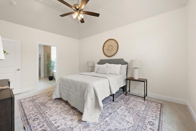 10949 Sandstone Ridge Way, Guthrie, OK 73044 - bedroom with carpet flooring, lofted ceiling, baseboards, and ceiling fan