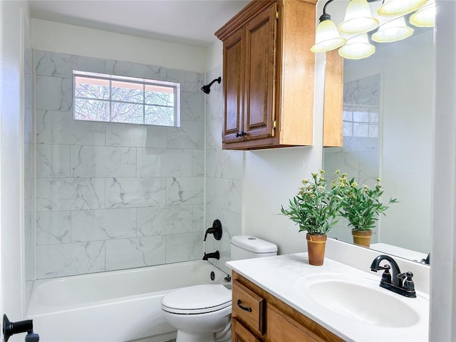 bathroom with toilet, shower / washtub combination, and vanity