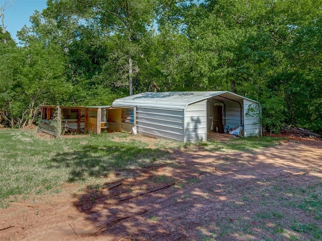 view of outdoor structure with a carport