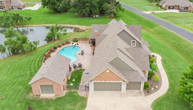 drone / aerial view featuring a water view