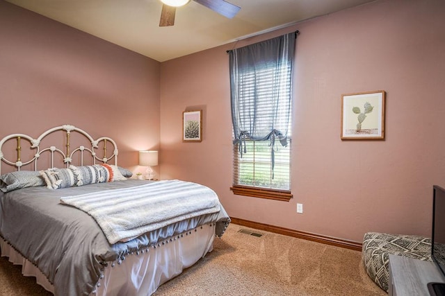 bedroom featuring visible vents, ceiling fan, baseboards, and carpet floors