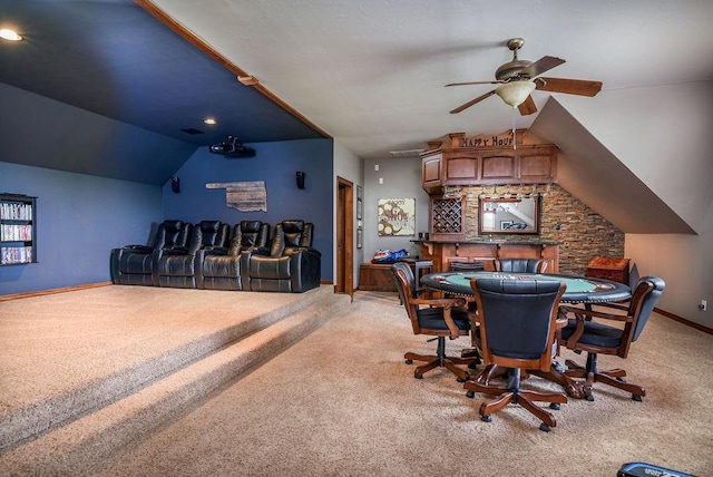 interior space featuring vaulted ceiling, baseboards, and light carpet