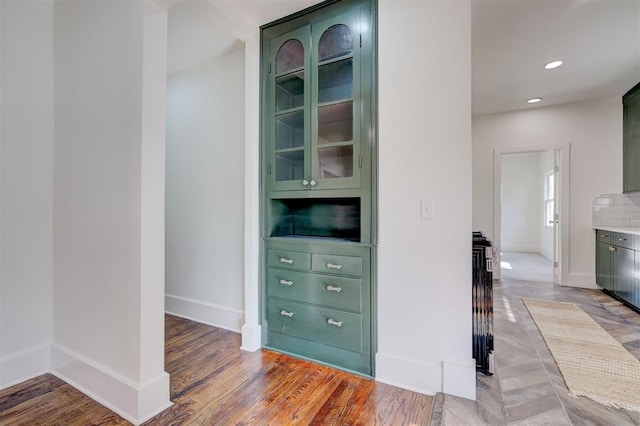 interior space featuring recessed lighting, light wood-type flooring, and baseboards