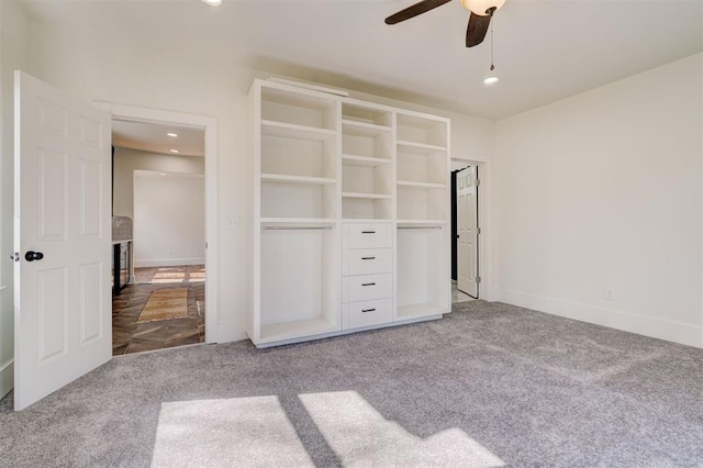 unfurnished bedroom with recessed lighting, baseboards, a ceiling fan, and carpet floors