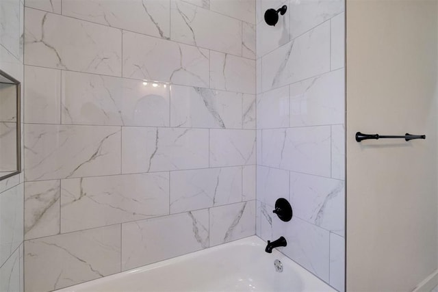 bathroom with bathtub / shower combination