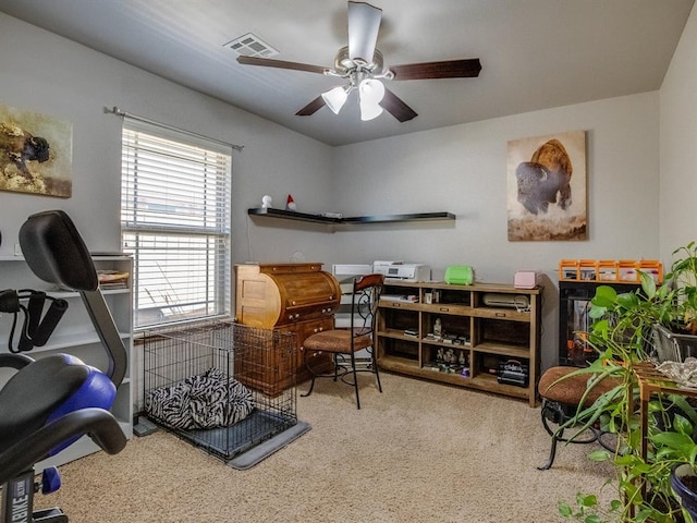 office featuring visible vents and a ceiling fan