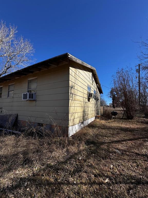 view of home's exterior featuring cooling unit