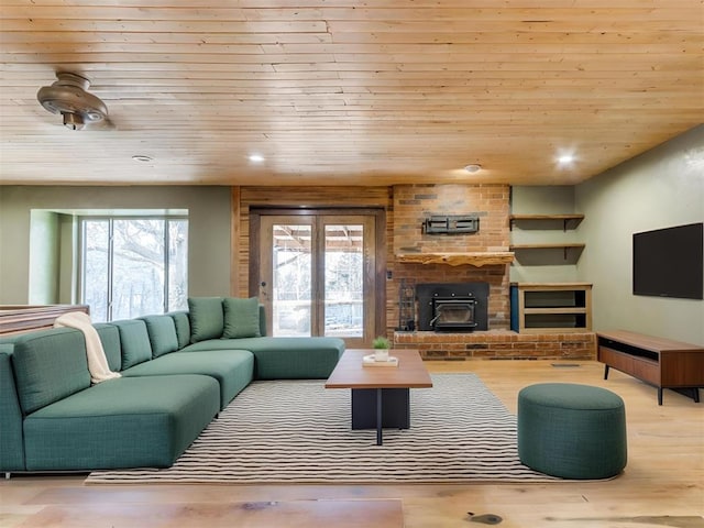 living area featuring plenty of natural light, wood finished floors, wood ceiling, and recessed lighting