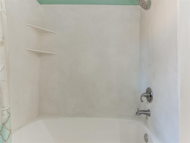 full bath featuring shower / bathtub combination