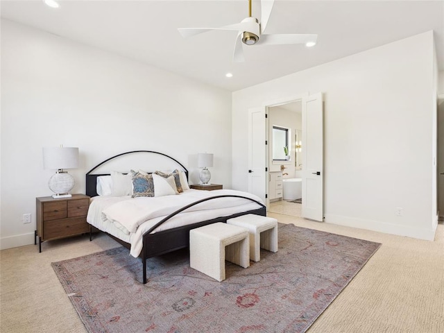 bedroom with baseboards, recessed lighting, and light colored carpet