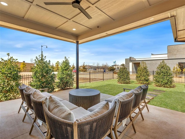 view of patio with a ceiling fan, outdoor lounge area, and a fenced backyard