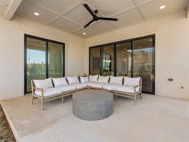 view of patio with ceiling fan and an outdoor living space