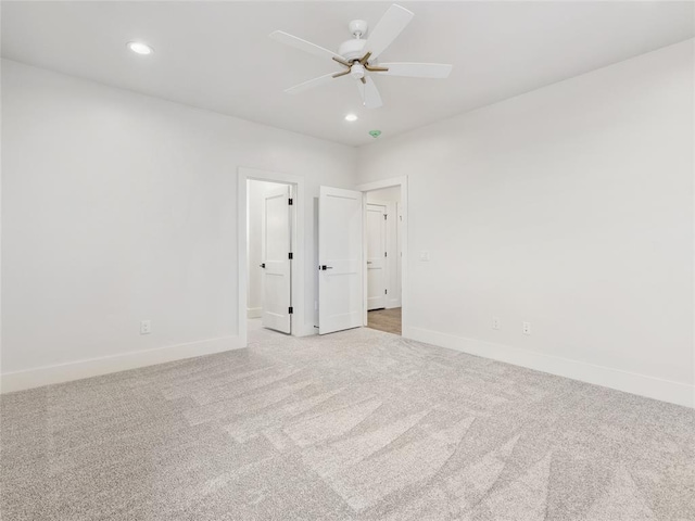 834 NW 72nd St, Oklahoma City, OK 73116 - unfurnished room featuring light carpet, baseboards, ceiling fan, and recessed lighting