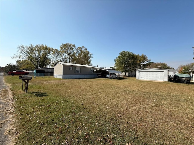 view of yard with an outbuilding