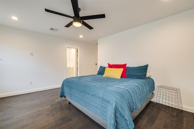 bedroom with recessed lighting, dark wood finished floors, visible vents, and baseboards