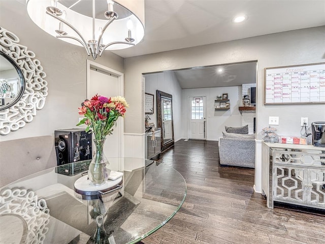 interior space with wood finished floors and recessed lighting