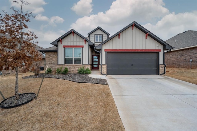 craftsman-style home with a garage, brick siding, driveway, and board and batten siding