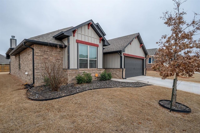 view of front of property featuring a garage, concrete driveway, a chimney, and roof with shingles