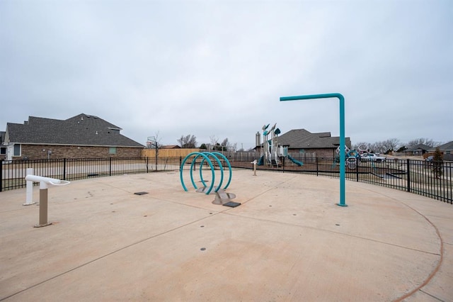 surrounding community featuring playground community and fence