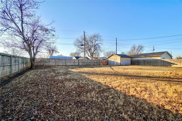 view of yard with a fenced backyard