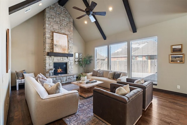 living area featuring high vaulted ceiling, a stone fireplace, dark wood-type flooring, visible vents, and beamed ceiling