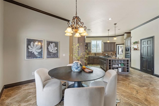 dining room featuring ornamental molding, recessed lighting, and baseboards