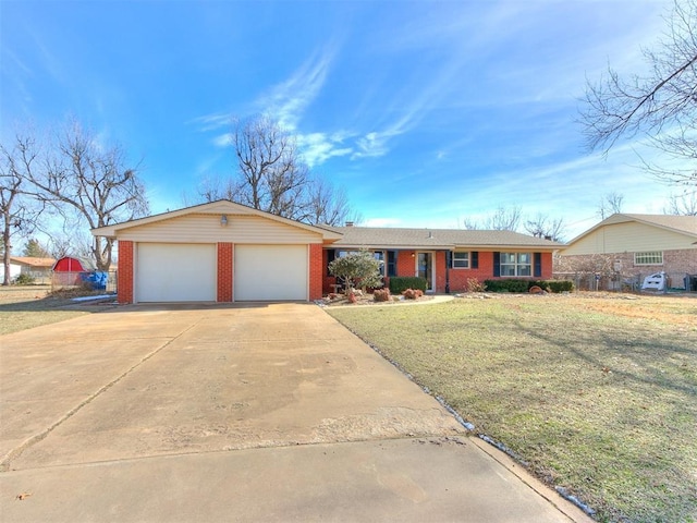 ranch-style house with a garage, concrete driveway, brick siding, and a front yard