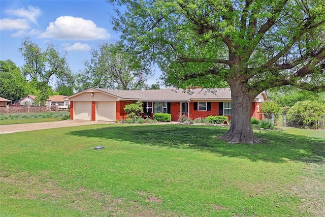 406 S Pine St, Crescent, OK 73028 - ranch-style house featuring a front yard, driveway, a garage, and fence