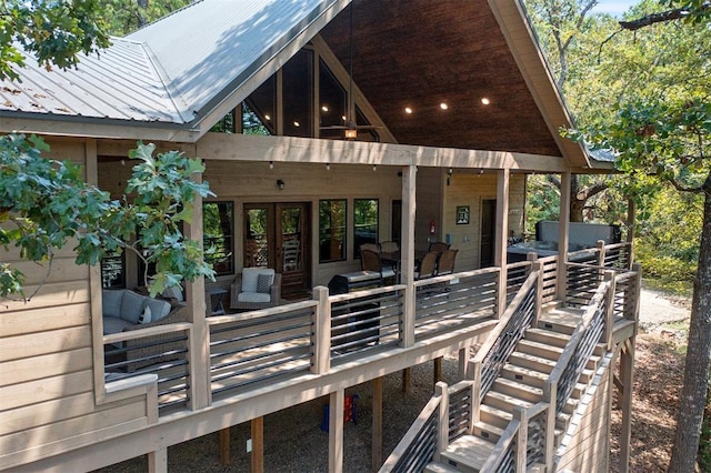 exterior space with stairs and an outdoor hangout area