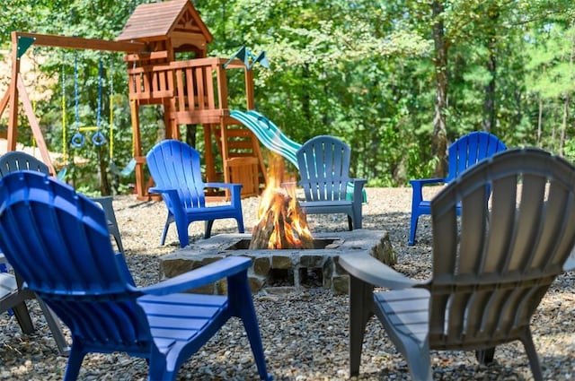 exterior space with an outdoor fire pit