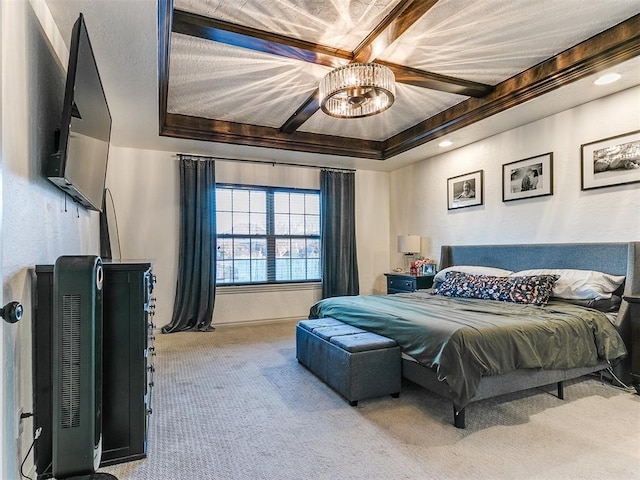 bedroom featuring a ceiling fan, a tray ceiling, and carpet flooring