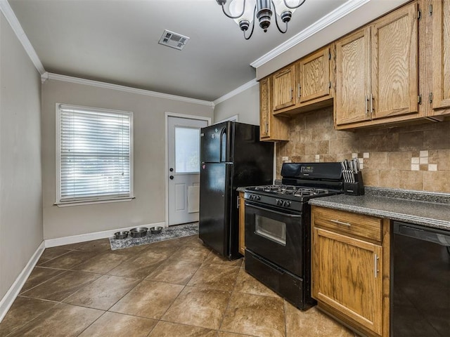 kitchen with tasteful backsplash, dark countertops, visible vents, ornamental molding, and black appliances