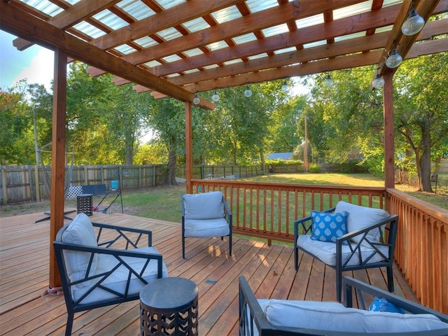 wooden terrace with a fenced backyard, a lawn, and a pergola